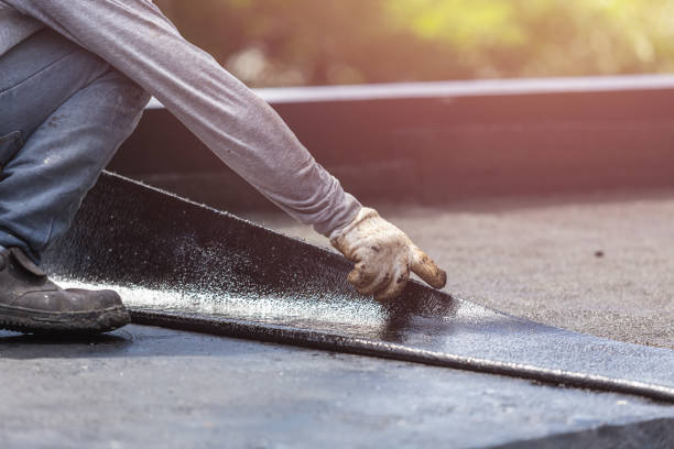 Professional Waterproofing technician working in Concord, NC